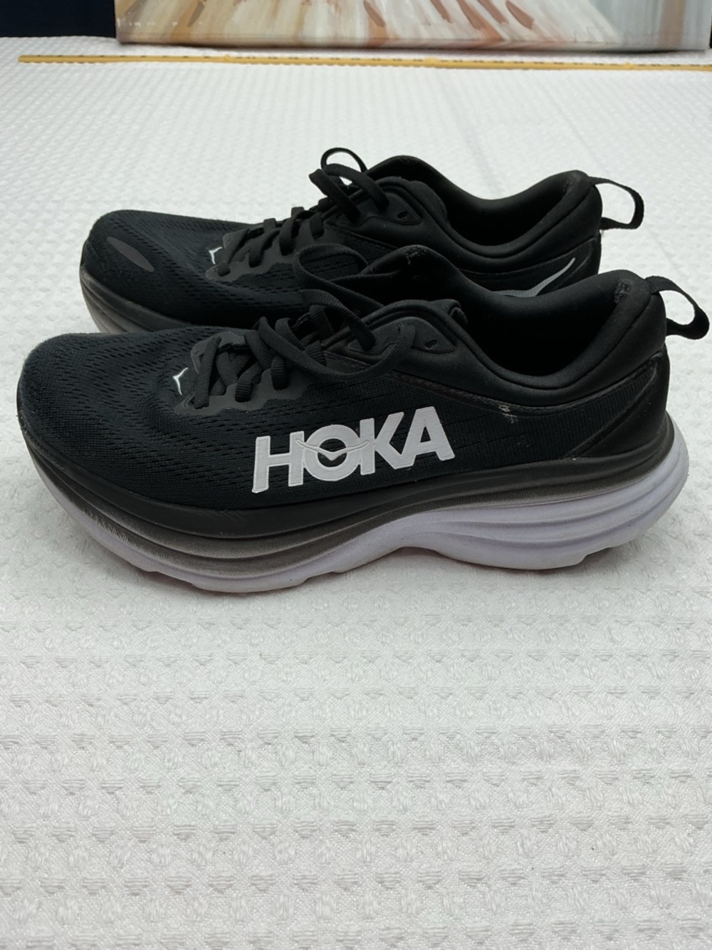 Hoka Black and White Cushion Running Sneakers